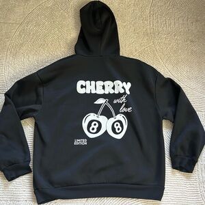 Black Hoodie with Cherry Graphic